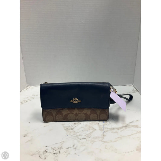 Wristlet Designer By Coach, Size: Medium